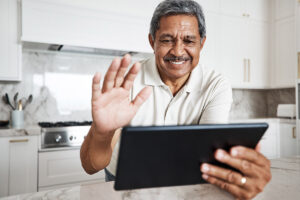 a person waves at a tablet during a consult where they asked "what is the success rate of second opinions?"