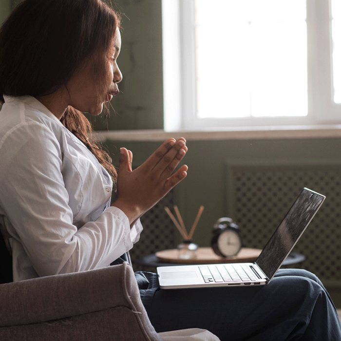 a patient uses a laptop to research the Benefits of Seeking a Medical Second Opinion